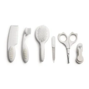 Complete baby grooming set with comb, brushes, nail file, scissors and clippers