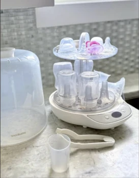 Snookums Electric Steam Steriliser with baby bottles, teats and accessories